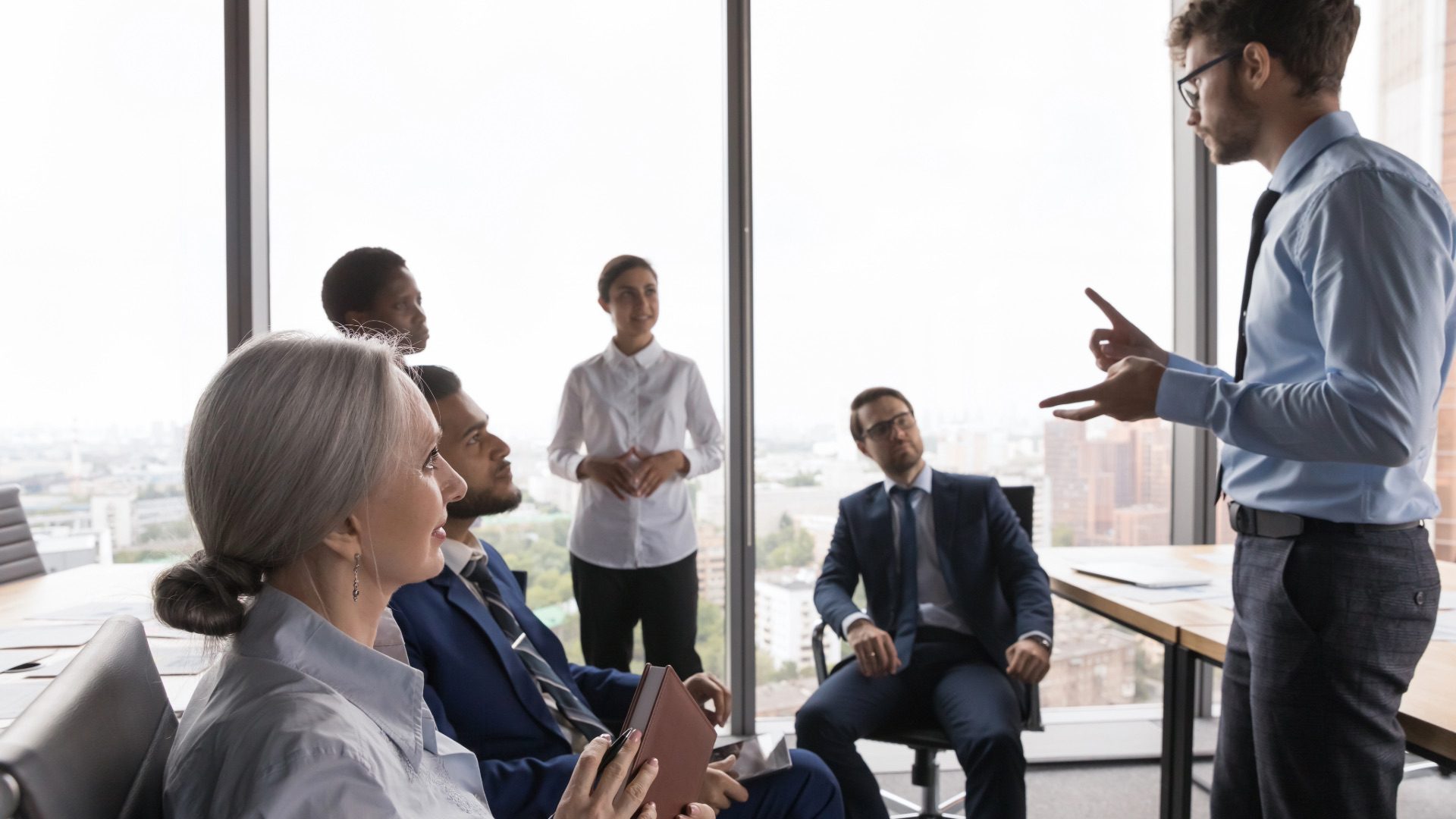 Discussing business sale to employees.