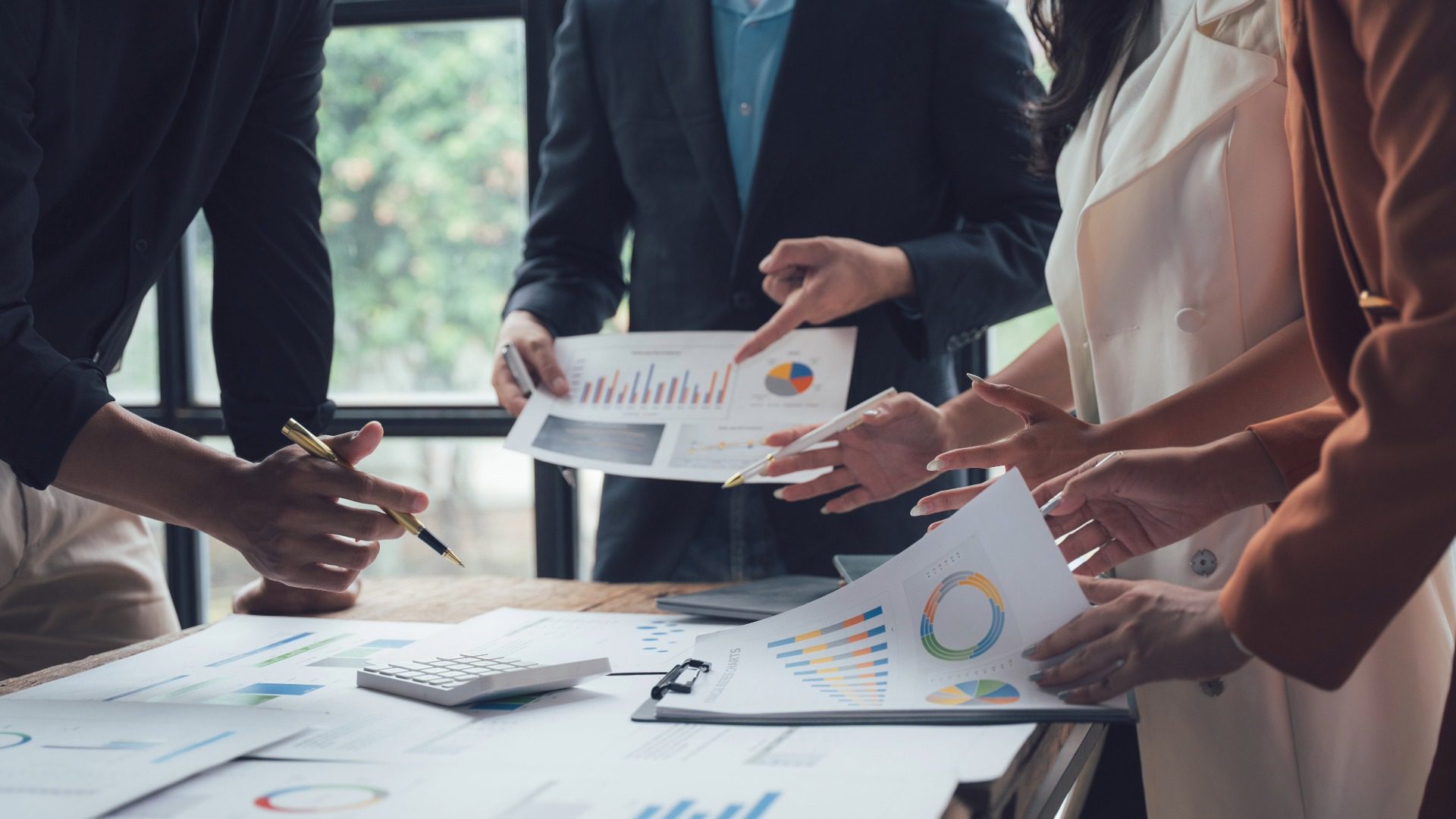Business owner reviewing financial information with an advisor to determine business value