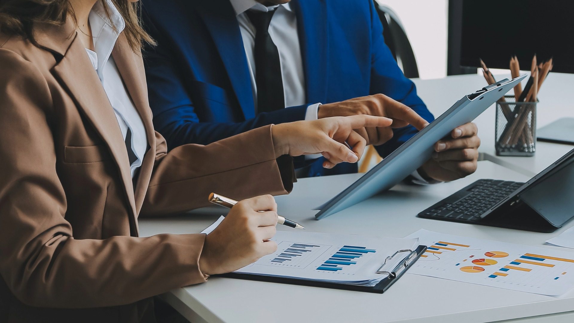 business assets (1) Business owner reviewing company assets for valuation